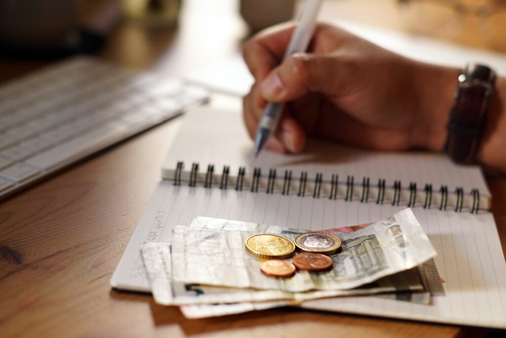 Closeup shot of an entrepreneur working from home on his personal finances and savings